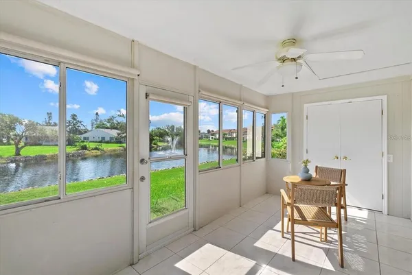 a kitchen with cabinets appliances a sink and a window