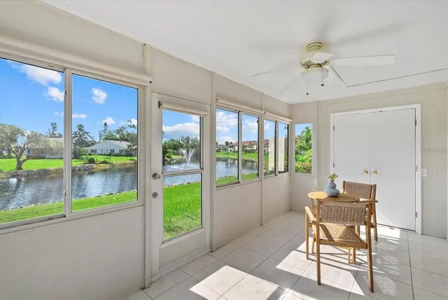 a work room with windows and wooden floor