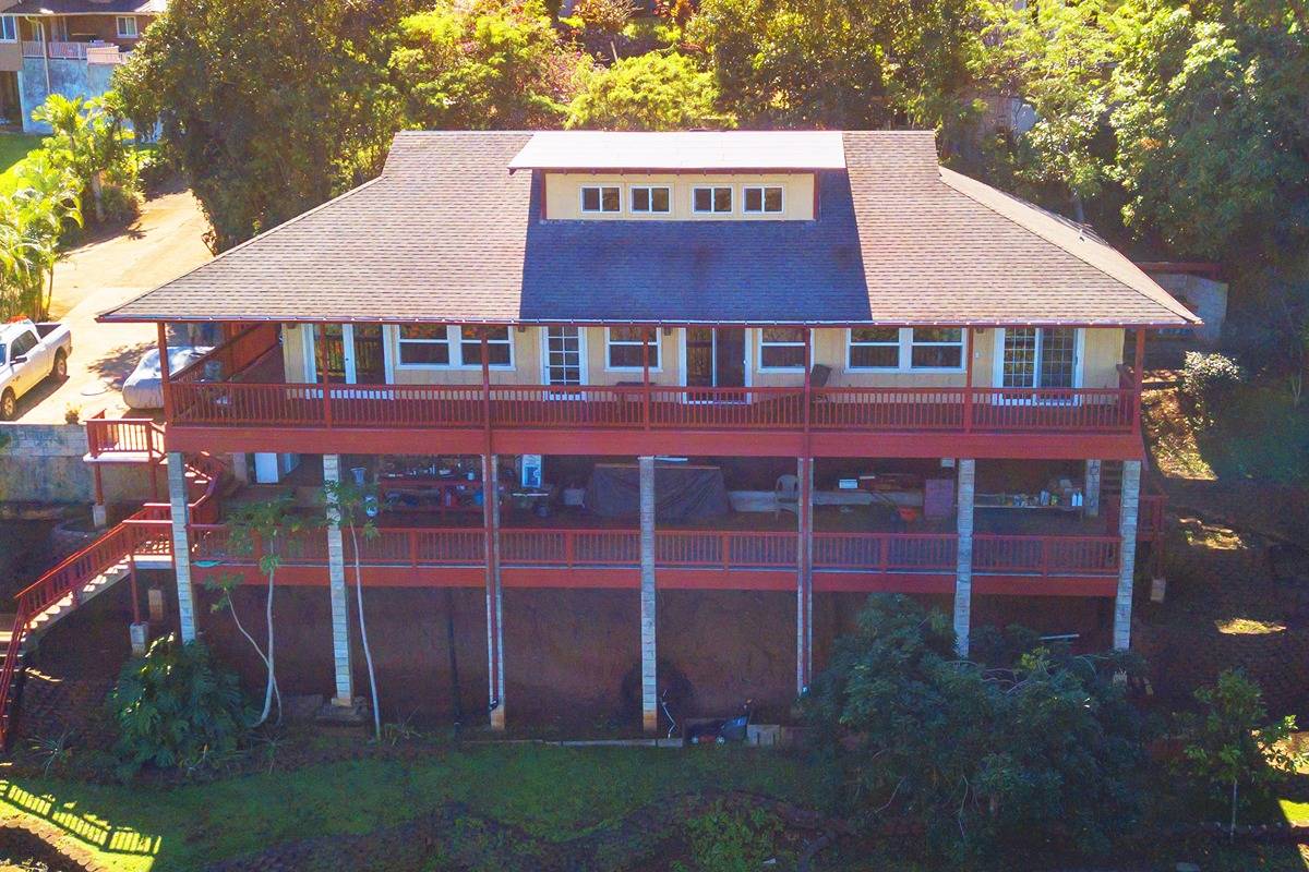 5241 Wili Road Kapaa, HI 96746 - Photo 23 of 28 a front view of a house with a garden