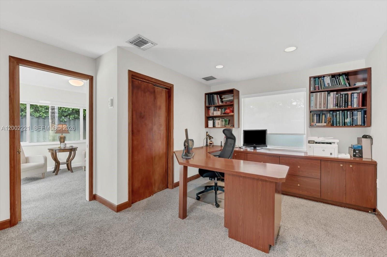 9941 Southwest 143rd Street Miami, FL 33176 - Photo 14 of 48 Office with a pocket leading to your bonus room!