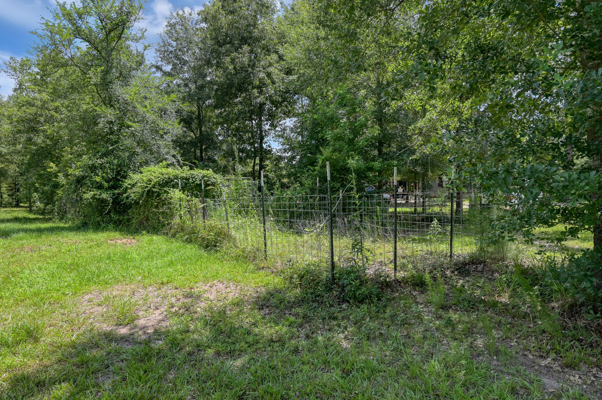 400 Raven Hill Road Oakhurst, TX 77359 - Photo 35 of 45 a view of a lake view