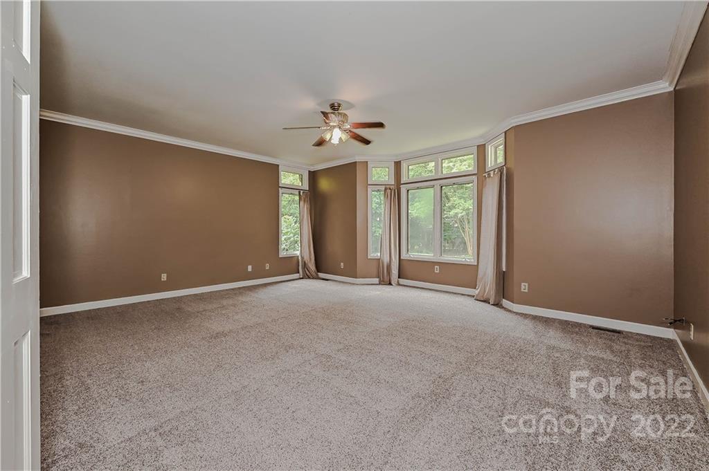 6430 Waters Edge Drive Midland, NC 28107 - Photo 20 of 48 a view of an empty room with a window