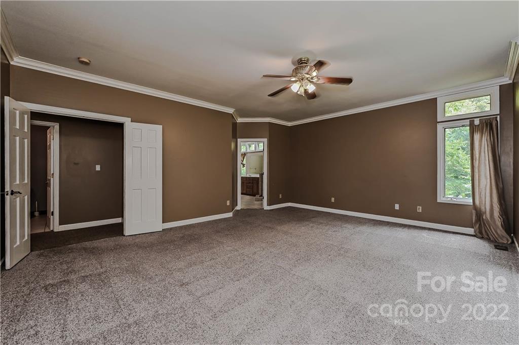 6430 Waters Edge Drive Midland, NC 28107 - Photo 21 of 48 a view of an empty room with a window