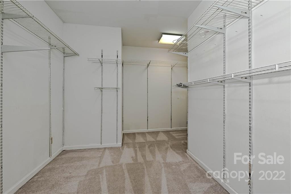 6430 Waters Edge Drive Midland, NC 28107 - Photo 24 of 48 a view of room with walk in closet