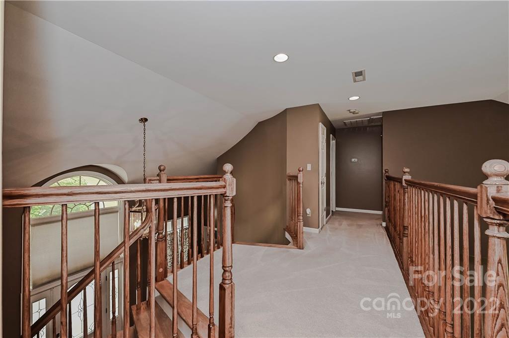 6430 Waters Edge Drive Midland, NC 28107 - Photo 27 of 48 a view of entryway with wooden floor