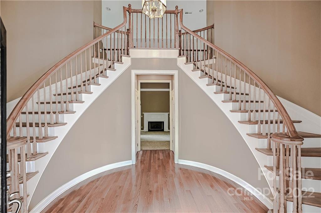 6430 Waters Edge Drive Midland, NC 28107 - Photo 3 of 48 a view of entryway with wooden floor