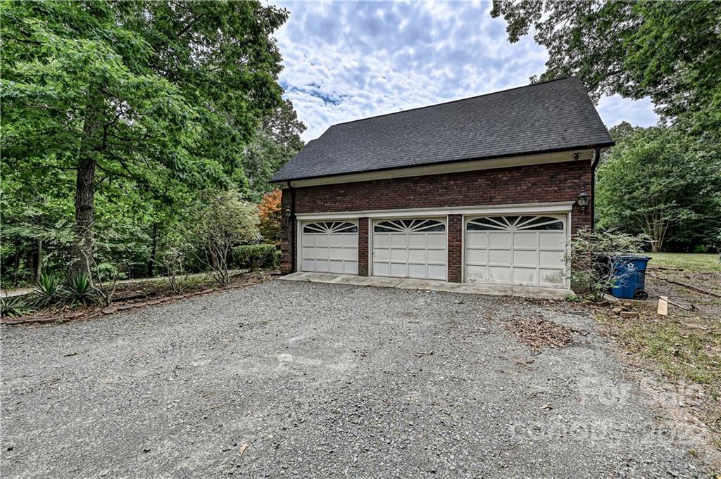 6430 Waters Edge Drive Midland, NC 28107 - Photo 44 of 48 a house view with a backyard space