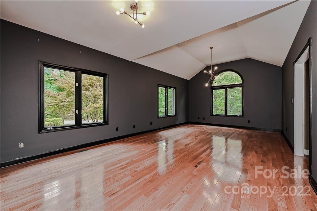 6430 Waters Edge Drive Midland, NC 28107 - Photo 7 of 48 a view of empty room with a fireplace