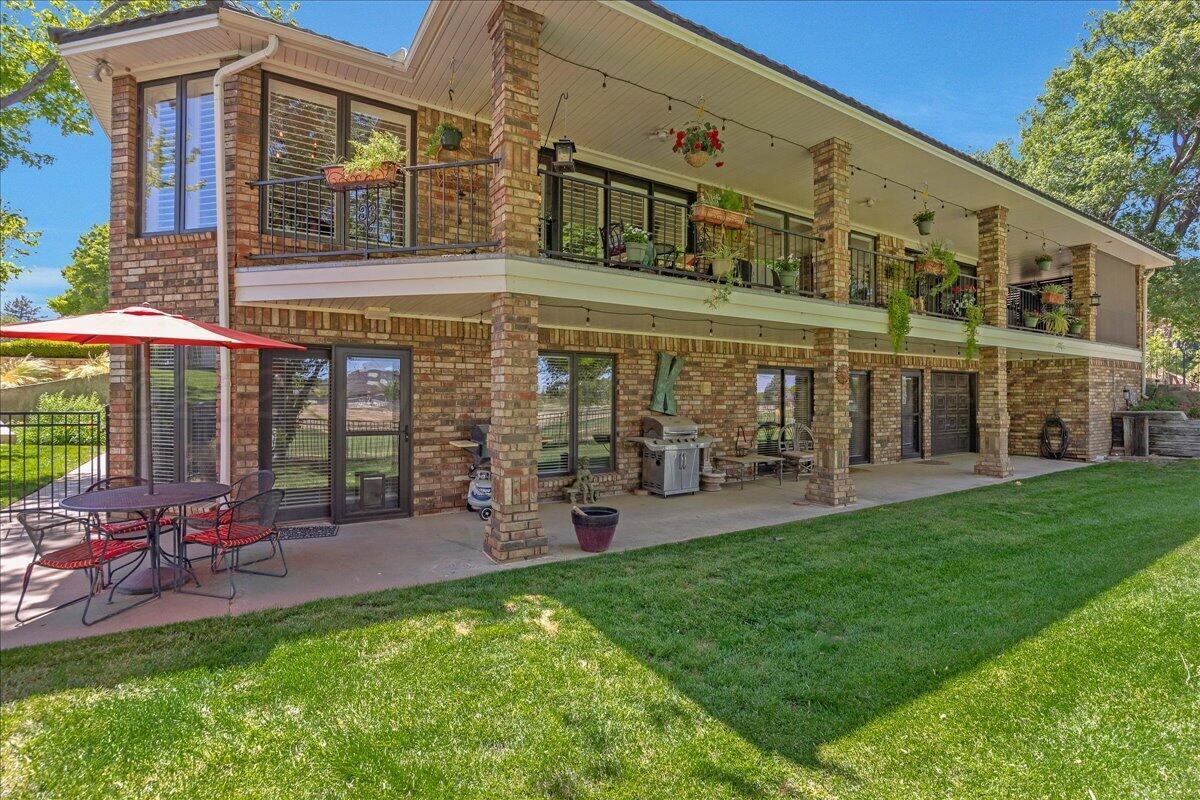 5 Locke Place Amarillo, TX 79124 - Photo 44 of 53 a front view of a house with a garden and patio