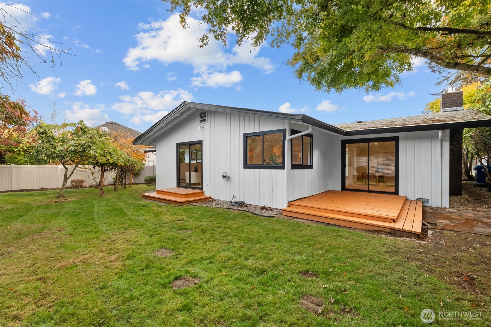 1414 Hummingbird Lane Northwest Olympia, WA 98502 - Photo 11 of 40 a front view of a house with a yard