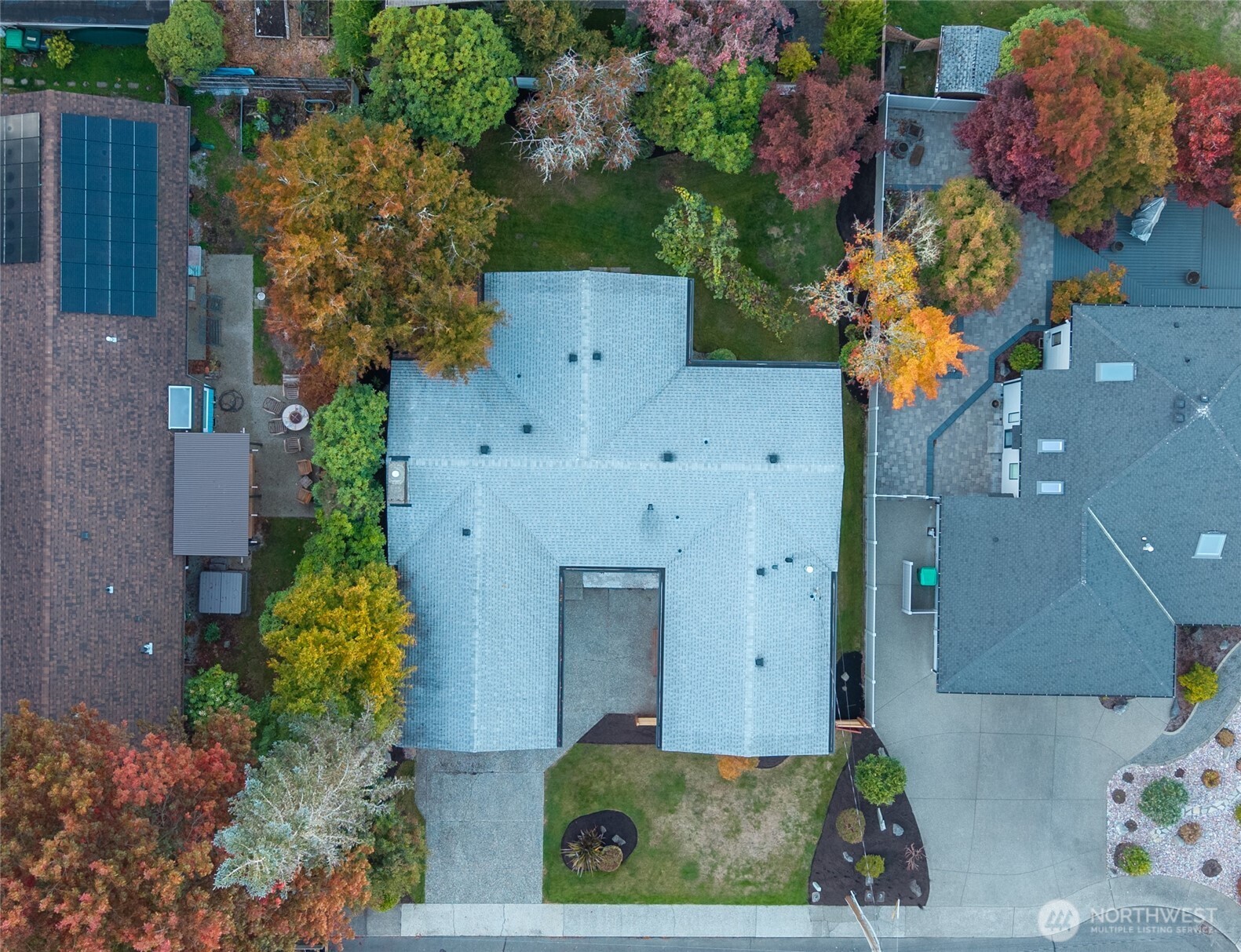 1414 Hummingbird Lane Northwest Olympia, WA 98502 - Photo 13 of 40 an aerial view of a house with a yard and garden