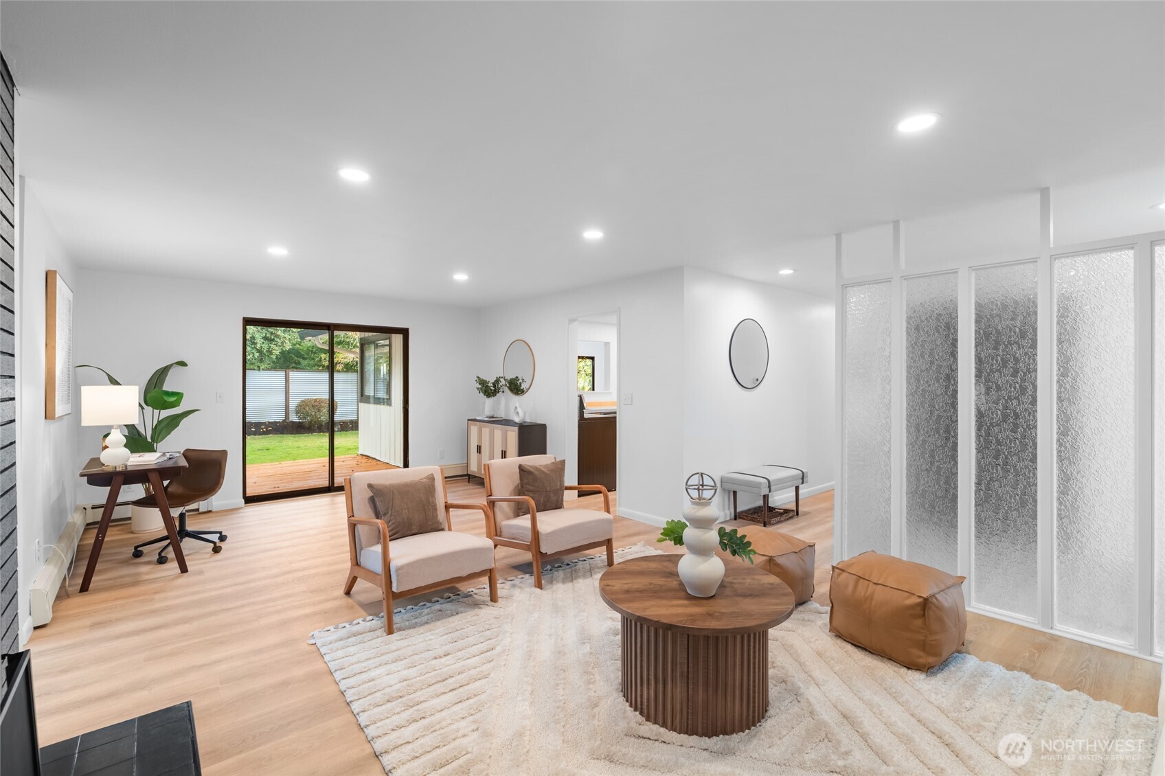 1414 Hummingbird Lane Northwest Olympia, WA 98502 - Photo 17 of 40 a living room with furniture and a window