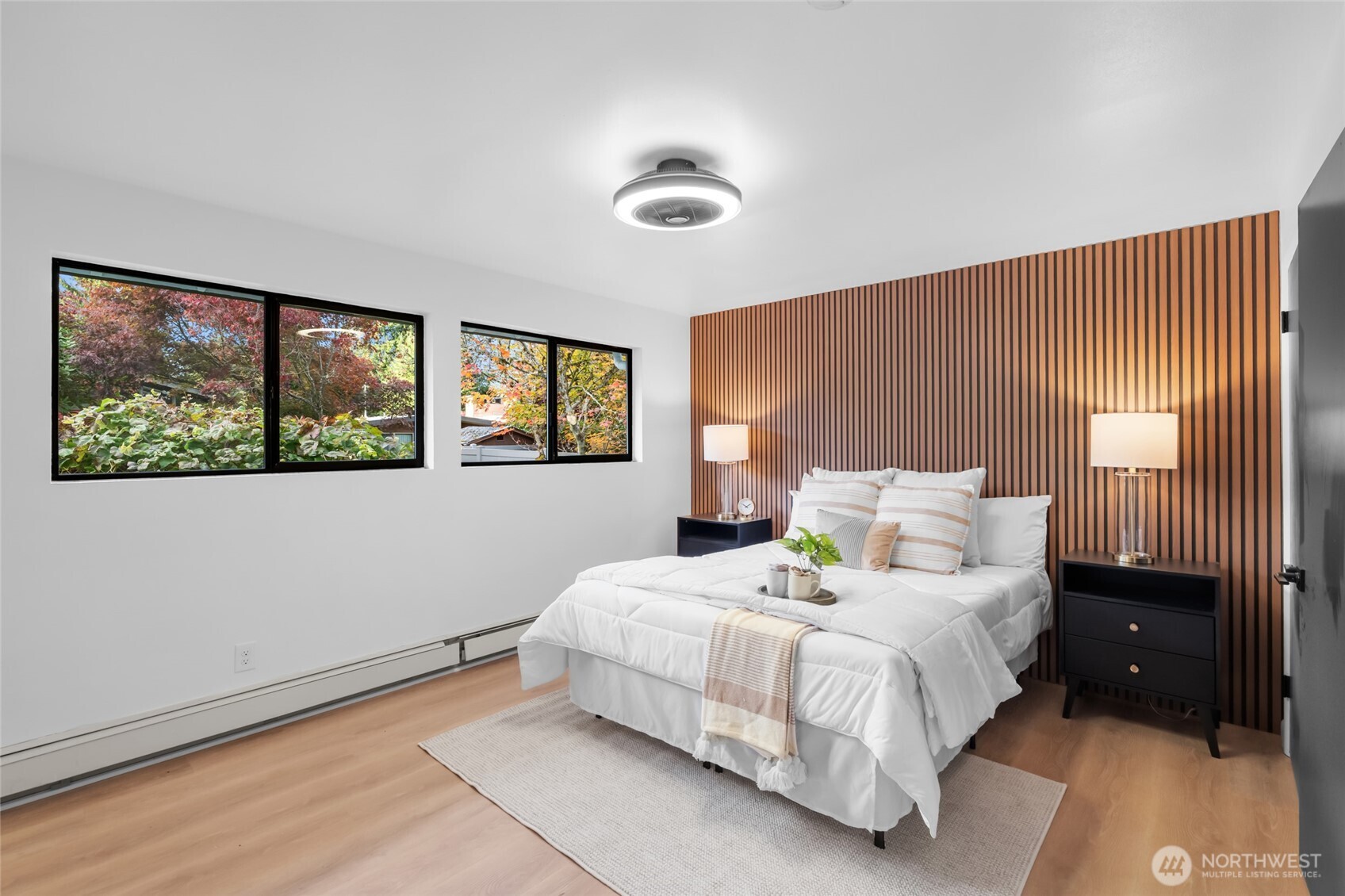 1414 Hummingbird Lane Northwest Olympia, WA 98502 - Photo 26 of 40 a bedroom with a bed and a window