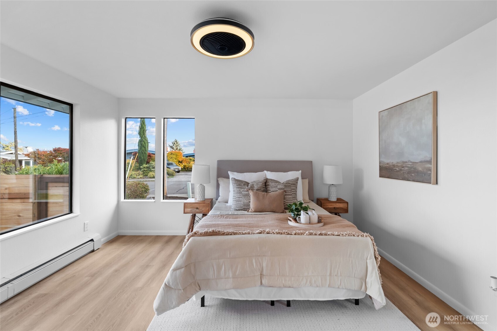 1414 Hummingbird Lane Northwest Olympia, WA 98502 - Photo 34 of 40 a bedroom with a large bed and a large window