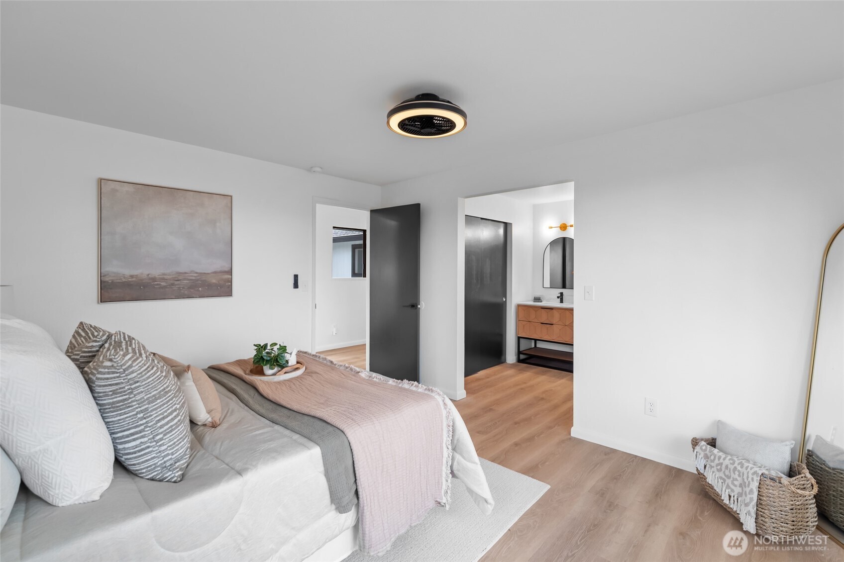 1414 Hummingbird Lane Northwest Olympia, WA 98502 - Photo 35 of 40 a bedroom with a bed and a couch