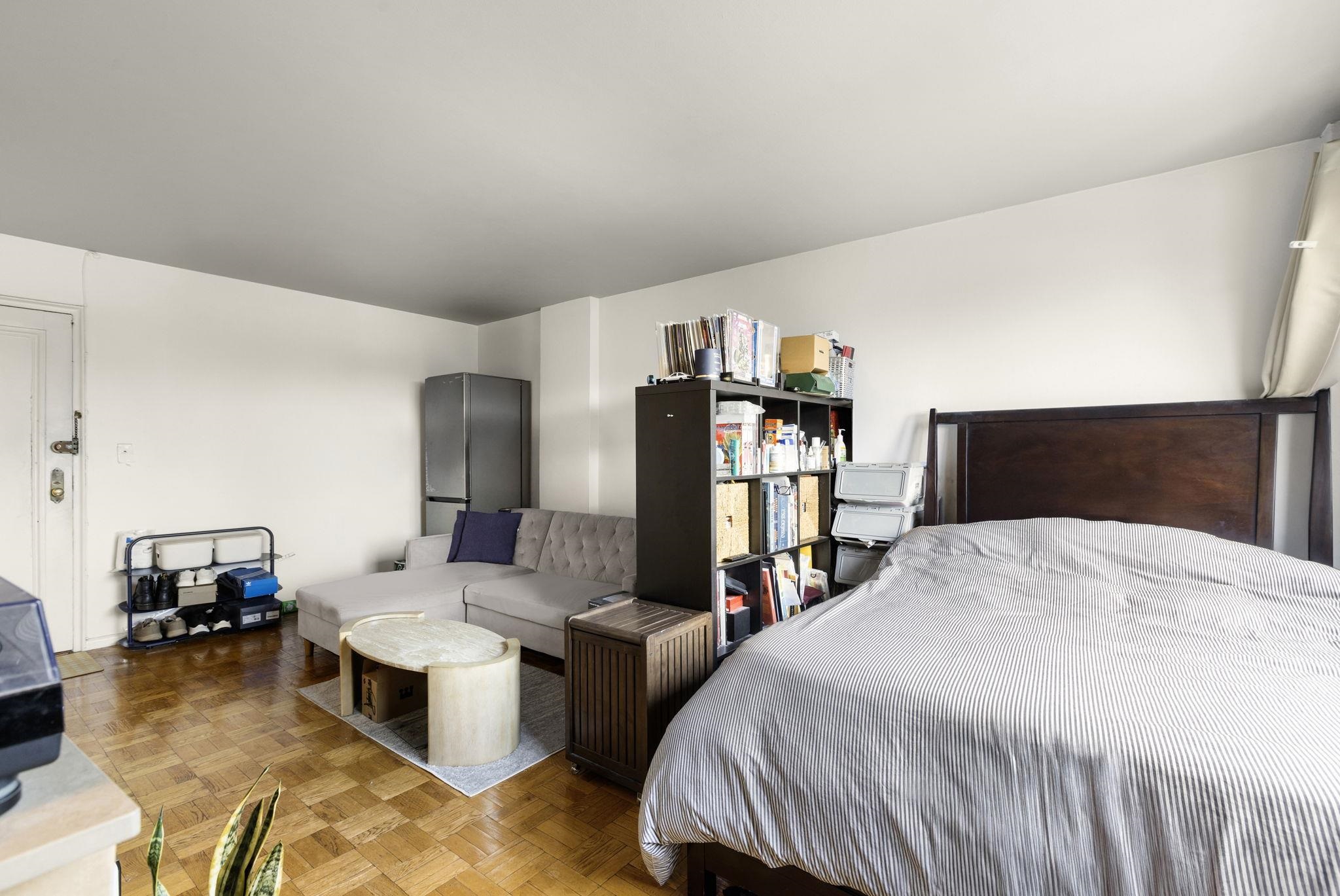 6515 Boulevard East, Unit 6R West New York, NJ 07093 - Photo 2 of 13 a bed room with a bed and a television