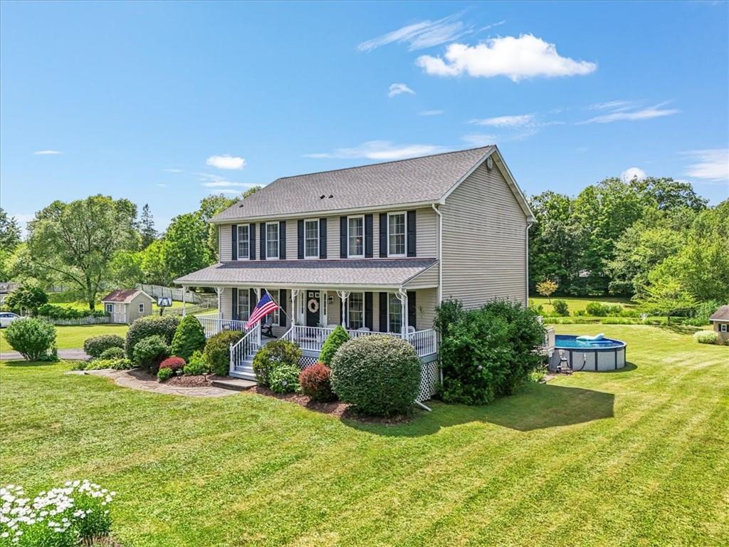 Gorgeous classic colonial on two acres, and with a pool and pond!