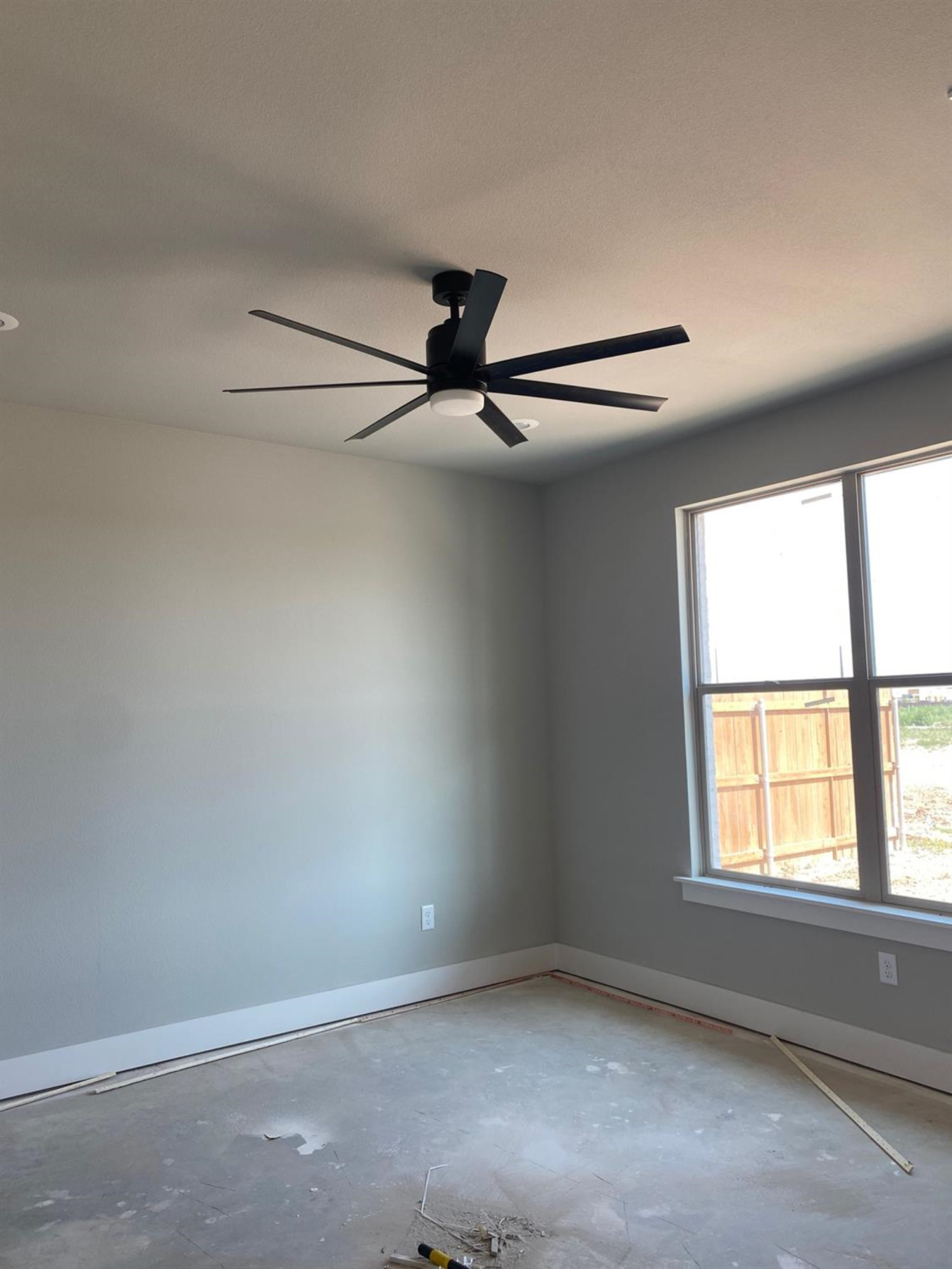 5845 Itasca Street Lubbock, TX 79416 - Photo 14 of 14 wooden floor in an empty room with a window