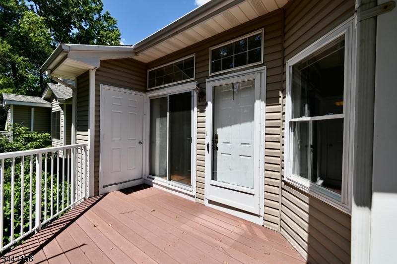 4 Cedar Court Bedminster, NJ 07921 - Photo 1 of 16 a view of a house with wooden floor and a large window
