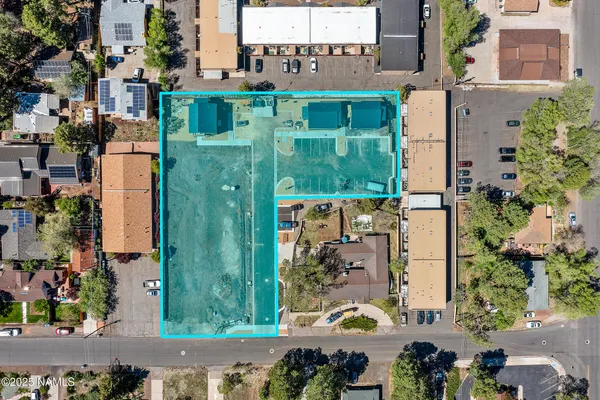 aerial view of residential houses with outdoor space