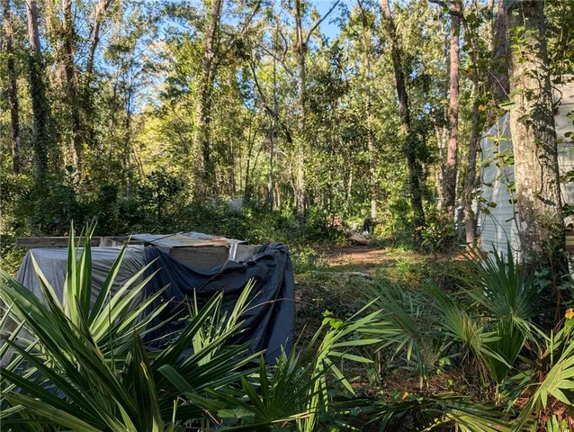 a view of outdoor space and yard