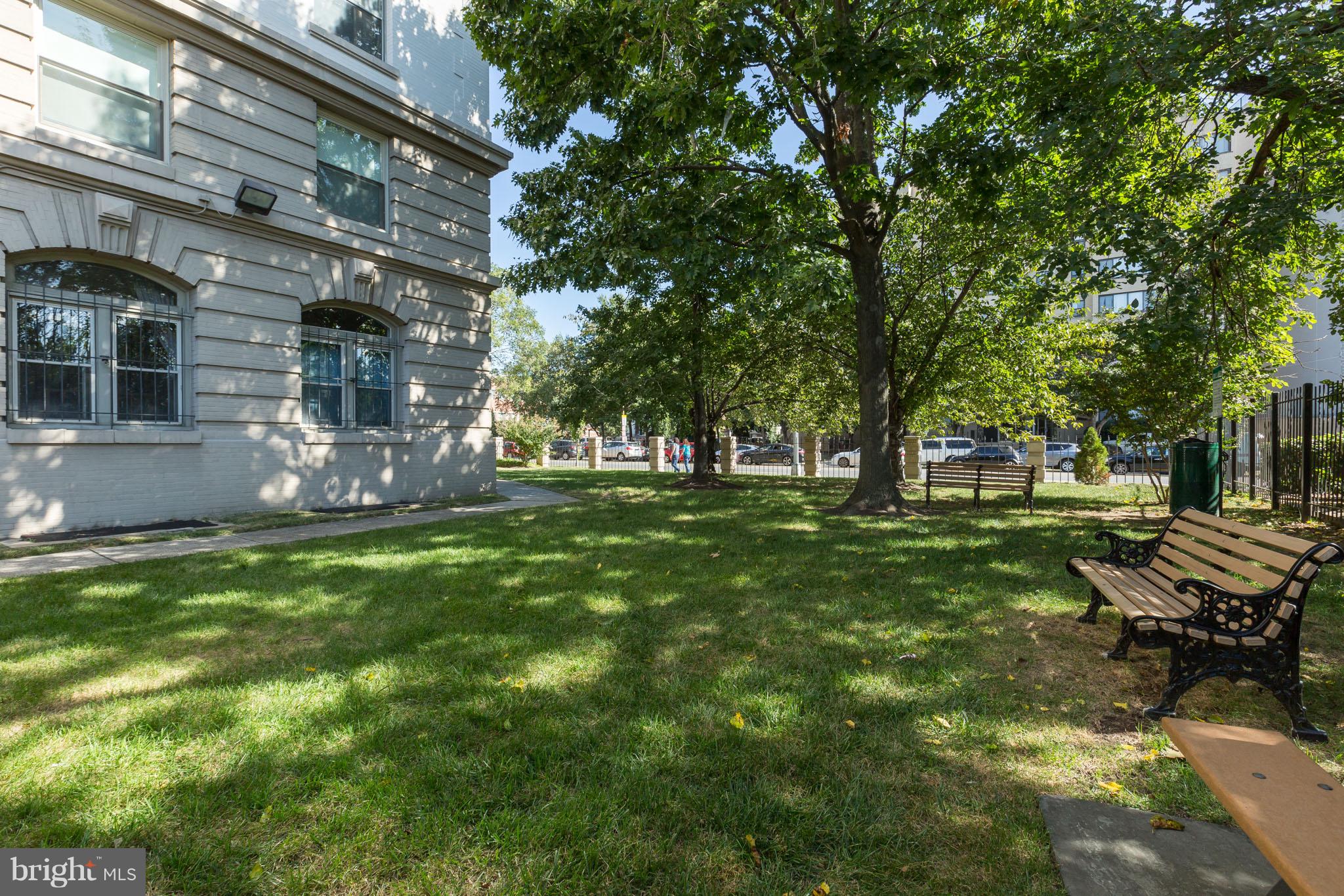 3060 16th Street Northwest, Unit 102 Washington, DC 20009 - Photo 17 of 17 a view of a house with a yard