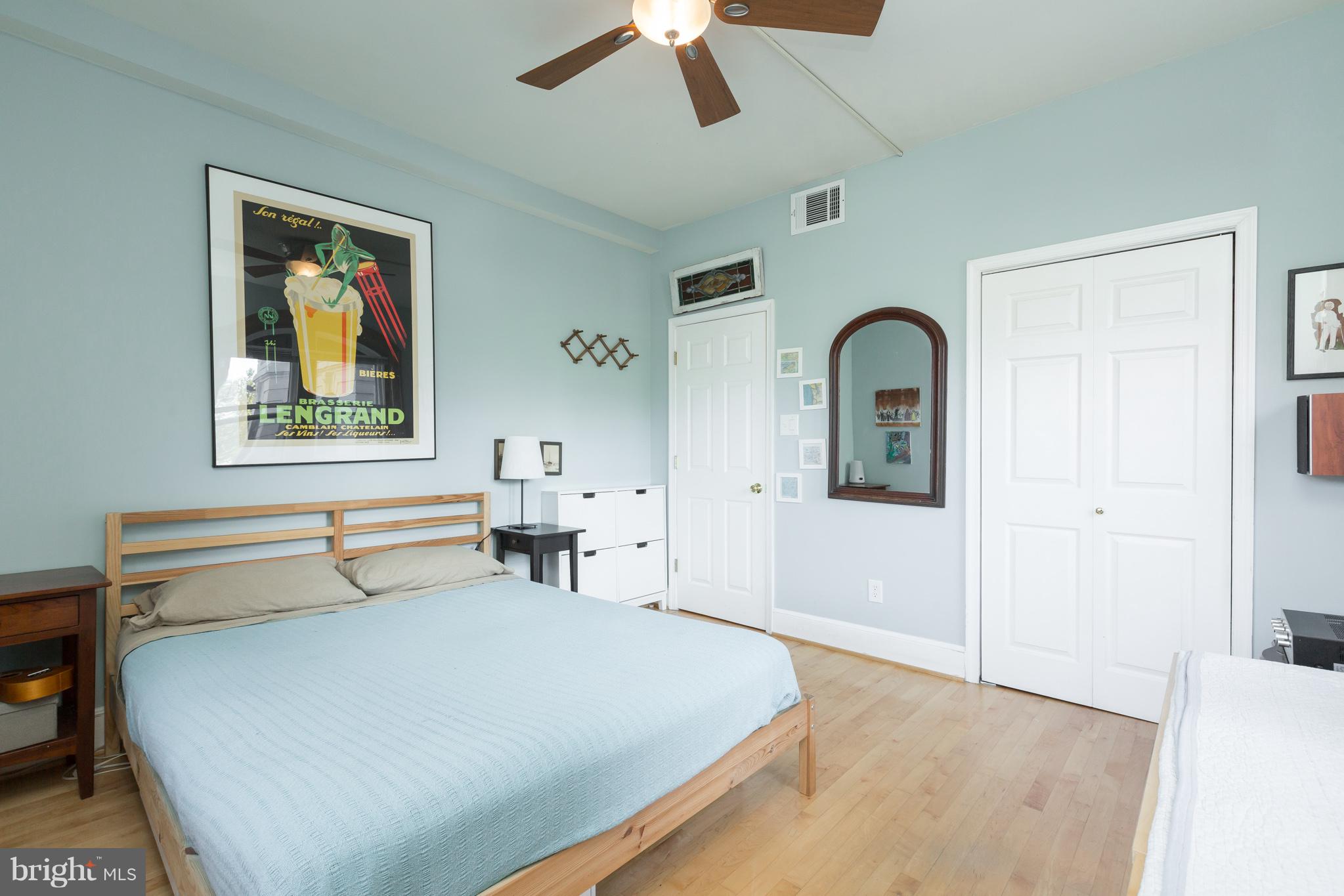 3060 16th Street Northwest, Unit 102 Washington, DC 20009 - Photo 10 of 17 a bedroom with furniture and window