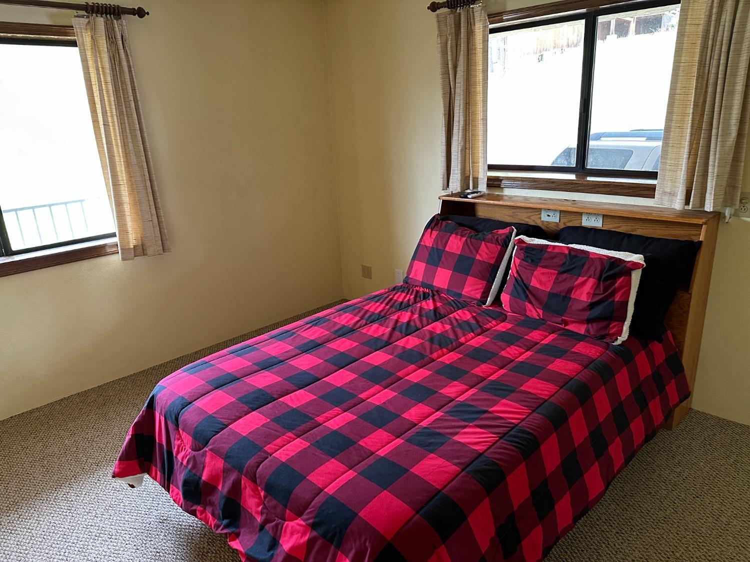 4368 Eazy Bird Road Wilseyville, CA 95257 - Photo 18 of 25 a bedroom with a bed and a window