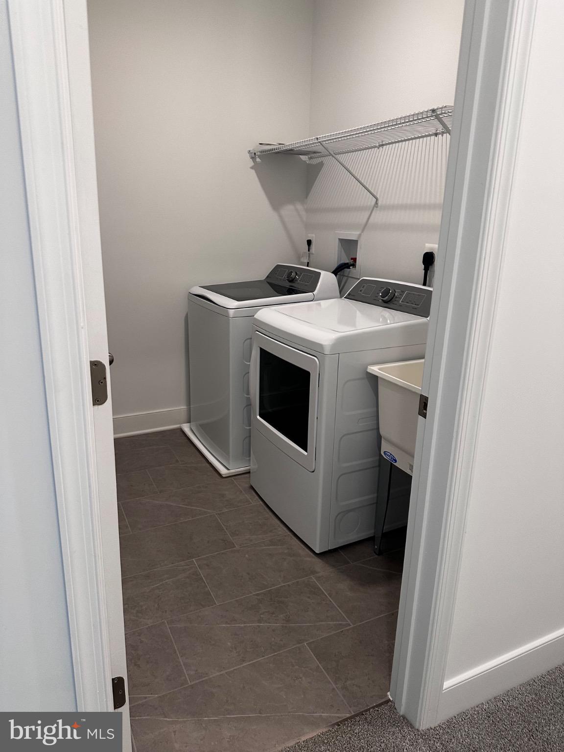 2504 West Peninsula Drive, Unit A Baltimore, MD 21207 - Photo 12 of 33 a utility room with dryer and washer