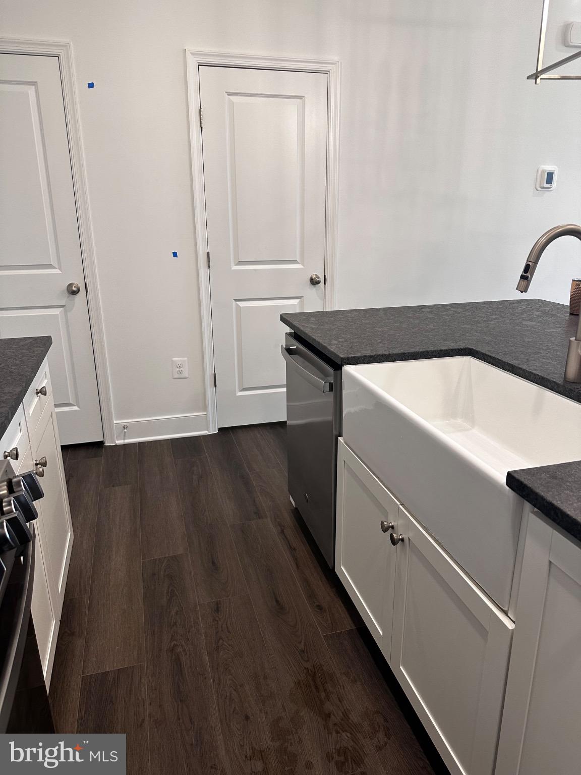 2504 West Peninsula Drive, Unit A Baltimore, MD 21207 - Photo 20 of 33 a kitchen with a sink and cabinets