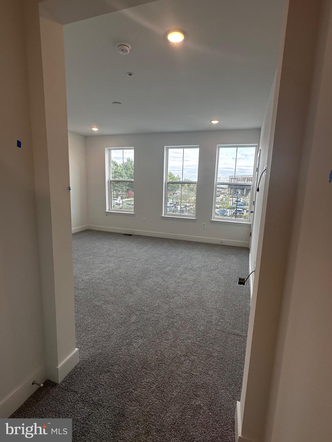 2504 West Peninsula Drive, Unit A Baltimore, MD 21207 - Photo 27 of 33 an empty room with windows