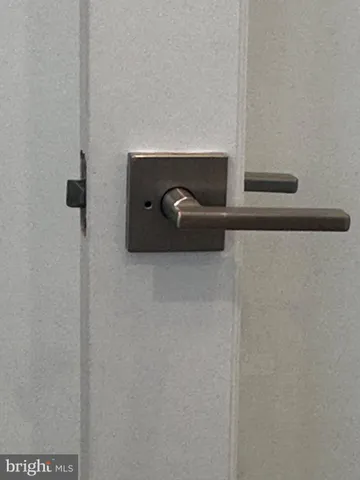 a view of a cars park fire pit and couches in a patio