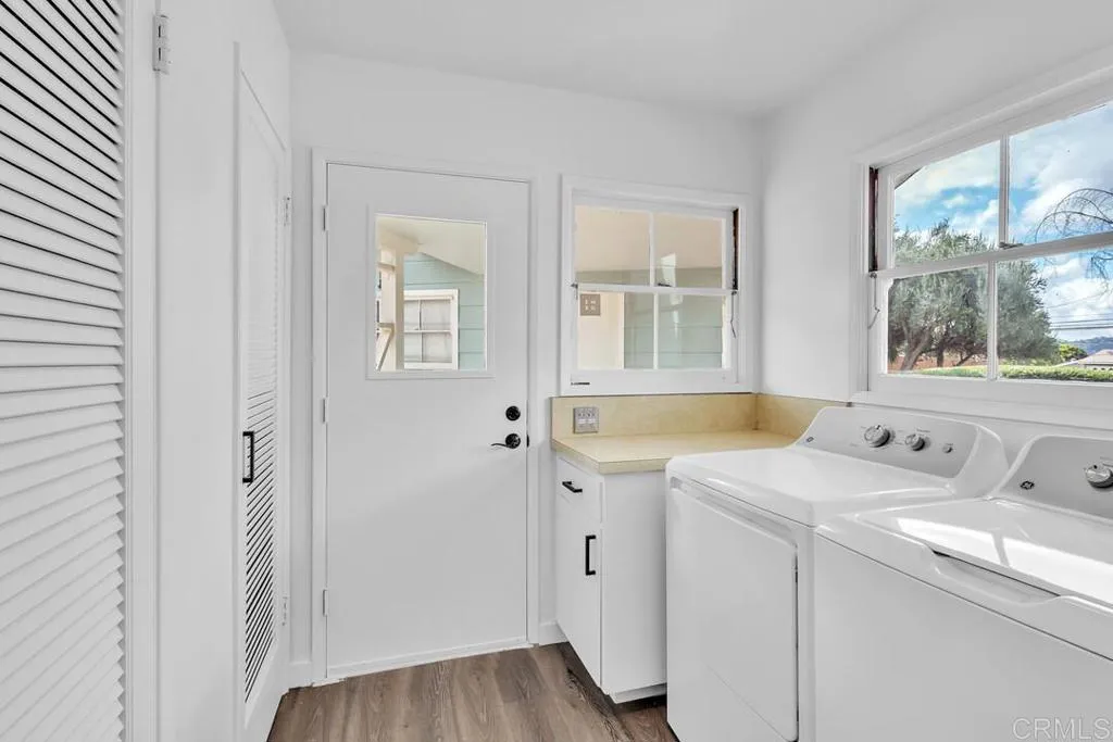 988 Pepper Drive El Cajon, CA 92021 - Photo 28 of 41 a utility room with dryer and washer