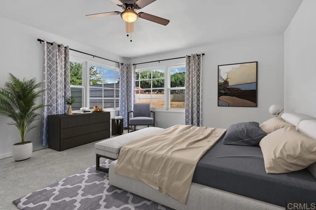 988 Pepper Drive El Cajon, CA 92021 - Photo 3 of 41 a bedroom with a bed and a window