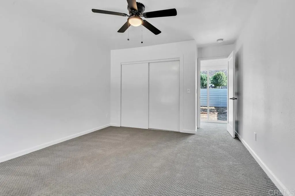 988 Pepper Drive El Cajon, CA 92021 - Photo 36 of 41 an empty room with windows and closet