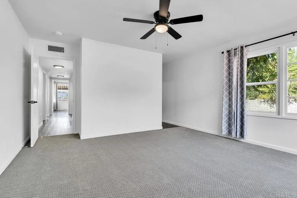 988 Pepper Drive El Cajon, CA 92021 - Photo 38 of 41 wooden floor in an empty room with a window