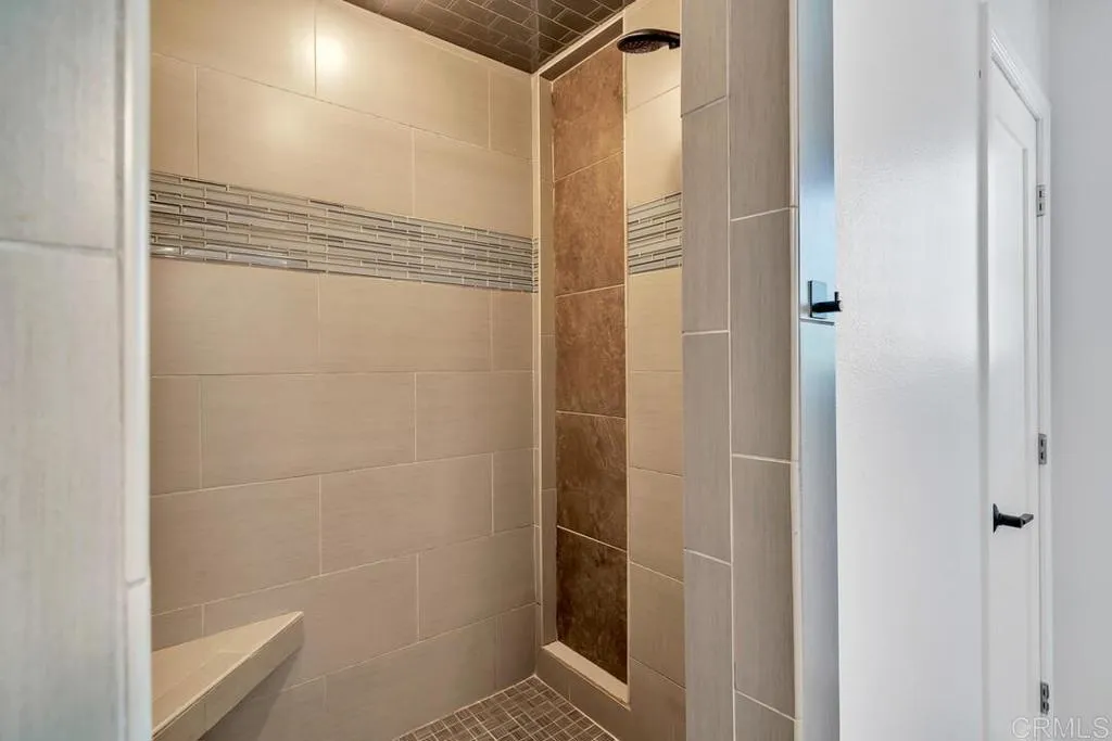 988 Pepper Drive El Cajon, CA 92021 - Photo 41 of 41 a bathroom with a shower and a glass door