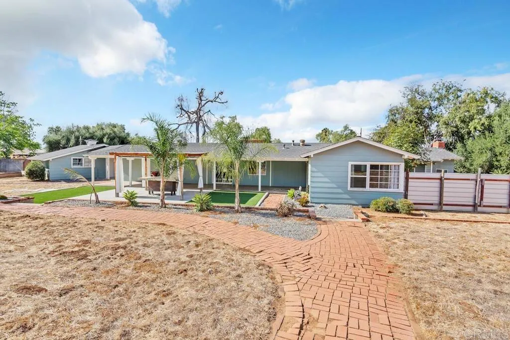 988 Pepper Drive El Cajon, CA 92021 - Photo 6 of 41 a view of a house with backyard and sitting area