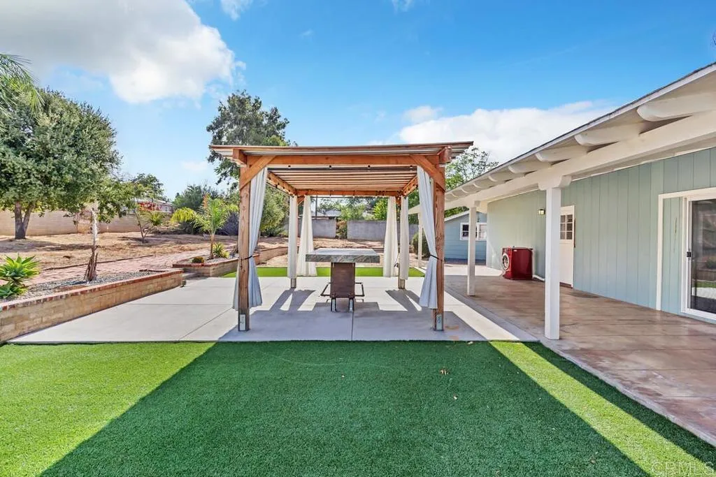 988 Pepper Drive El Cajon, CA 92021 - Photo 9 of 41 a view of outdoor space yard deck patio and outdoor kitchen
