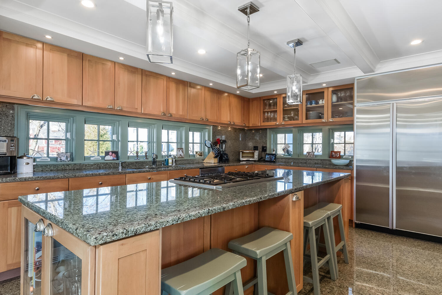 5 Plymouth Road Darien, CT 06820 - Photo 13 of 31 a large kitchen with a center island and stainless steel appliances