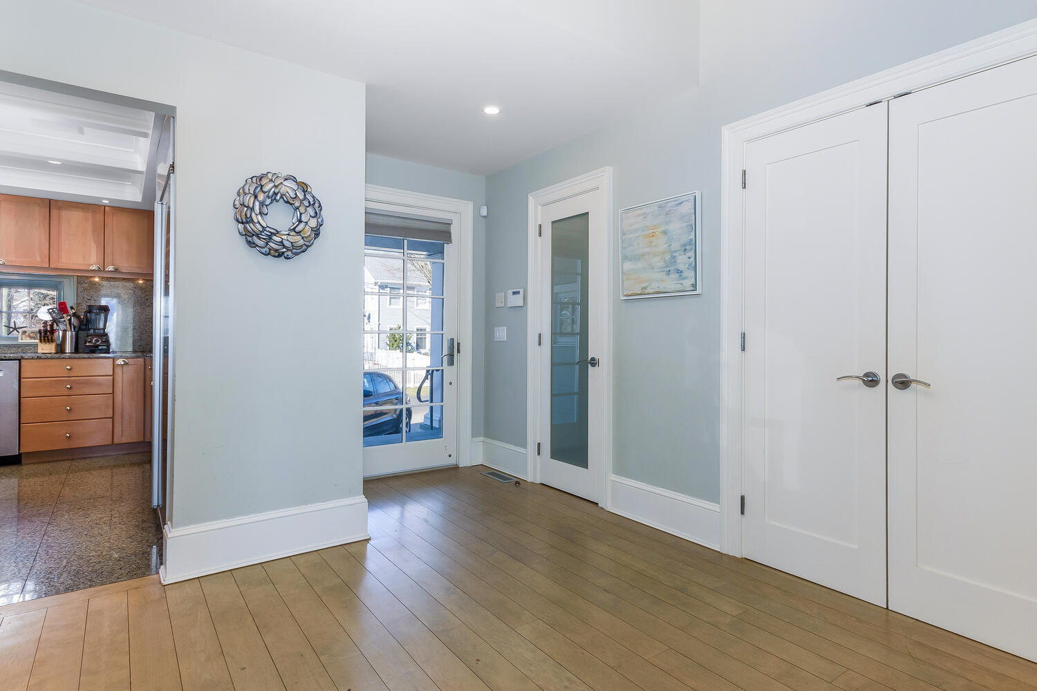 5 Plymouth Road Darien, CT 06820 - Photo 5 of 31 a view of a hallway with wooden floor