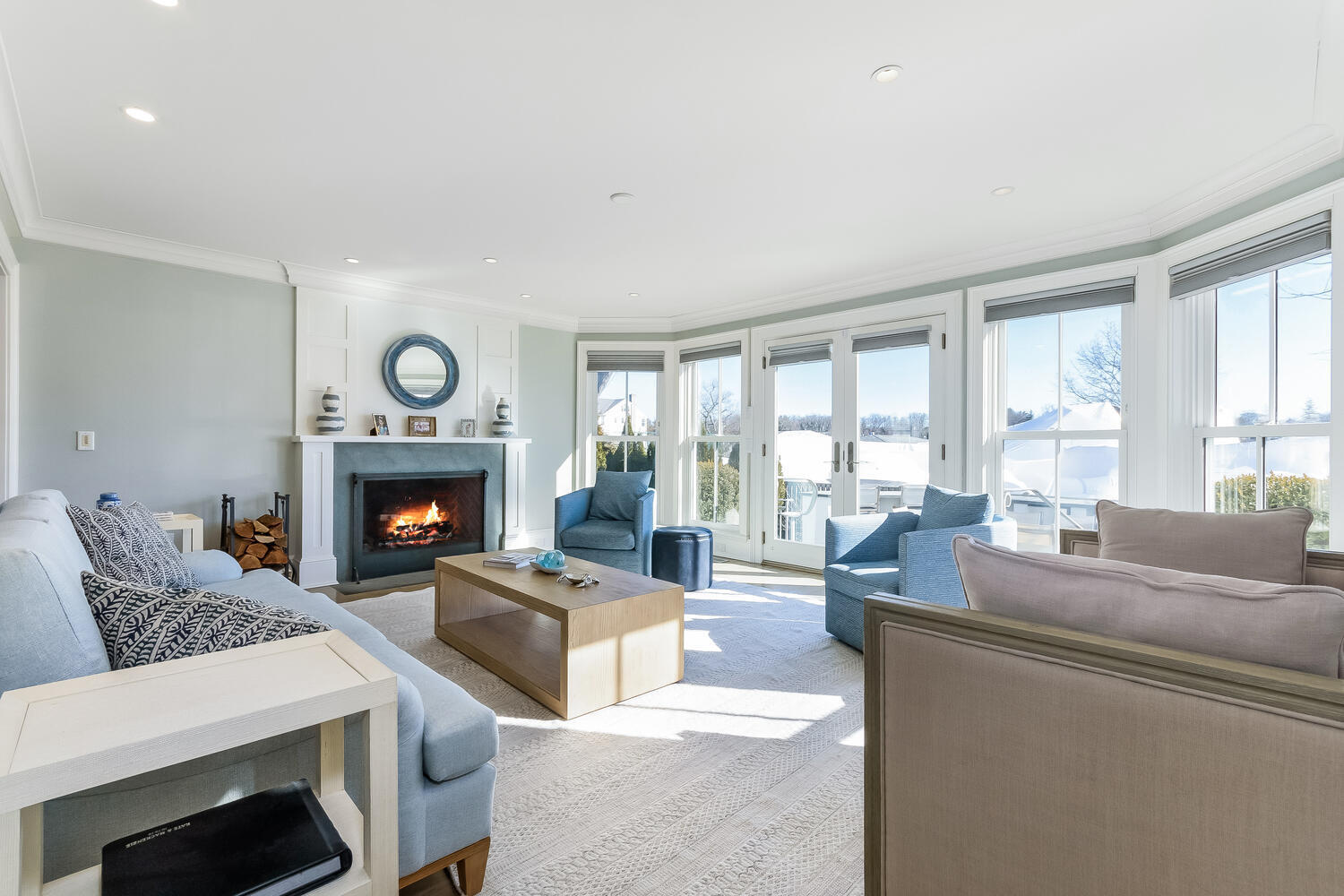 5 Plymouth Road Darien, CT 06820 - Photo 7 of 31 a living room with fireplace furniture and a large window