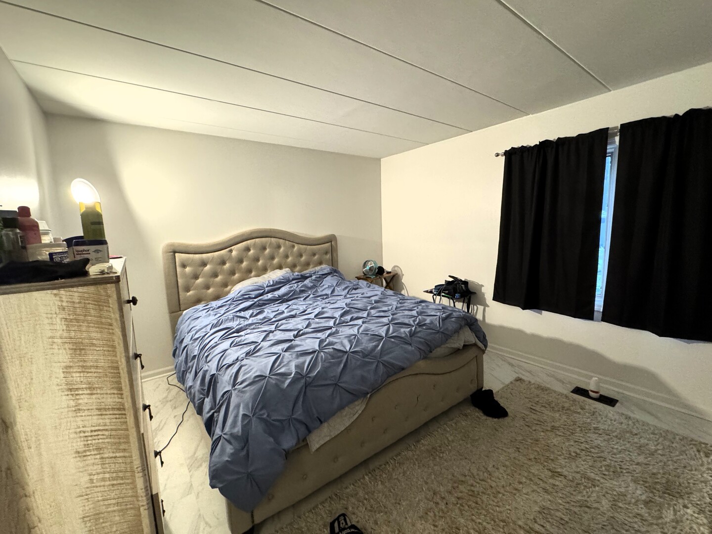 10840 Kilpatrick Avenue, Unit 1NW Oak Lawn, IL 60453 - Photo 6 of 11 a bedroom with a bed and wooden floor