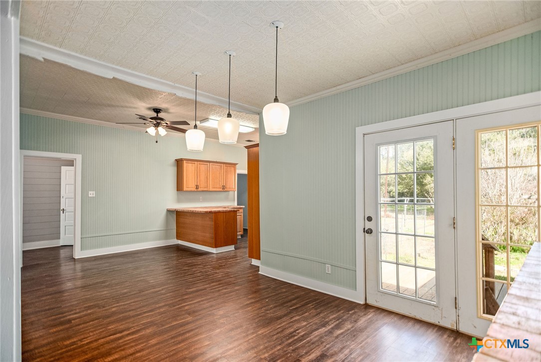 303 Garcitas Grove Road Inez, TX 77968 - Photo 8 of 39 a view of a room with wooden floor and window