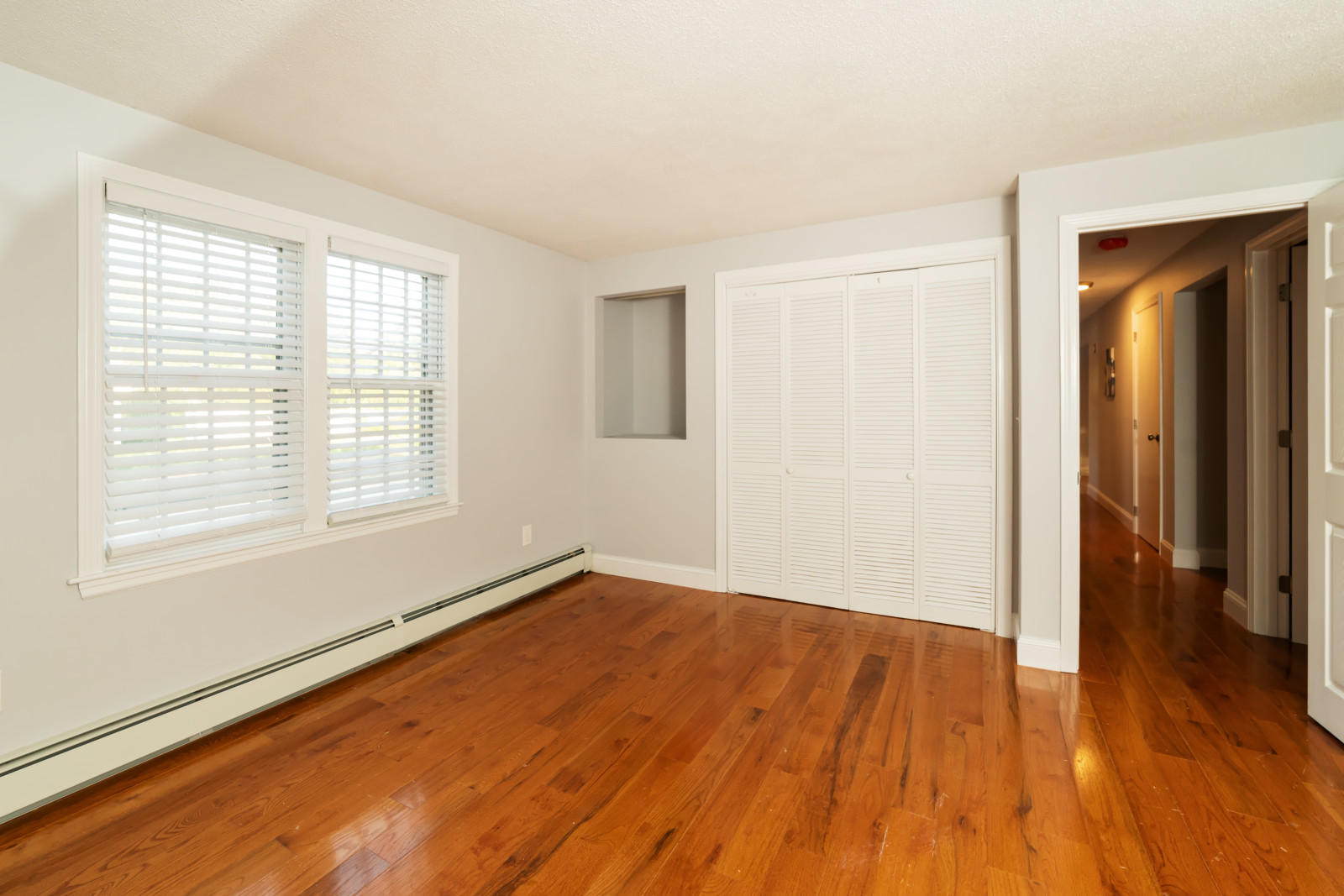 25 Fillmore Road West Yarmouth, MA 02673 - Photo 11 of 23 a view of an empty room with wooden floor and a window