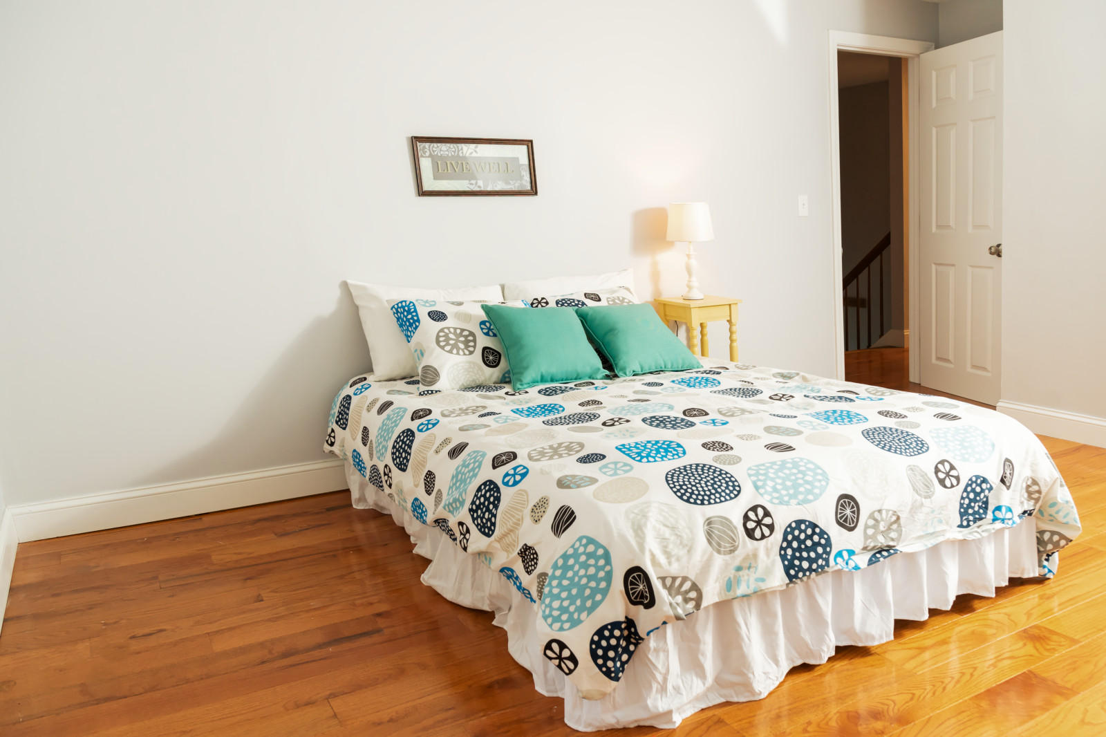 25 Fillmore Road West Yarmouth, MA 02673 - Photo 14 of 23 a large bed sitting in a bedroom next to a window