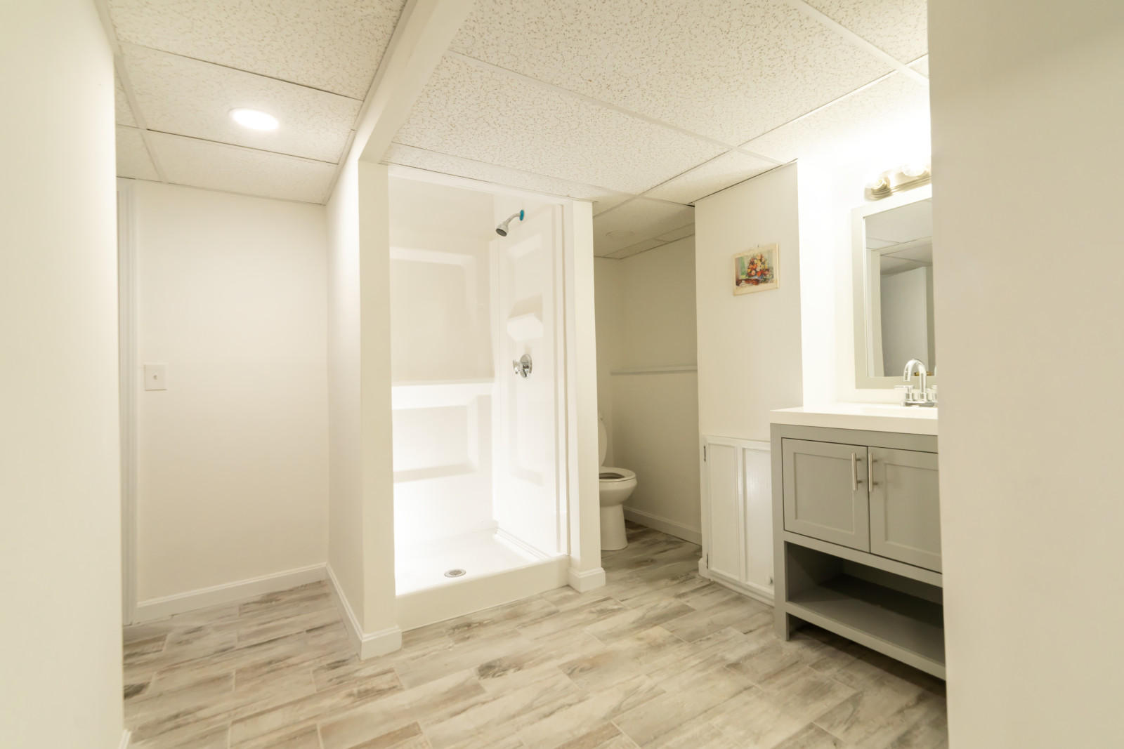 25 Fillmore Road West Yarmouth, MA 02673 - Photo 16 of 23 a bathroom with a sink a toilet and shower