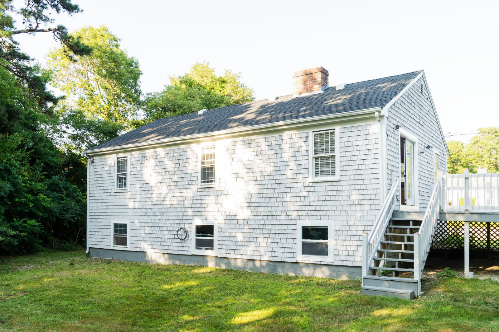 25 Fillmore Road West Yarmouth, MA 02673 - Photo 23 of 23 a front view of a house with a yard