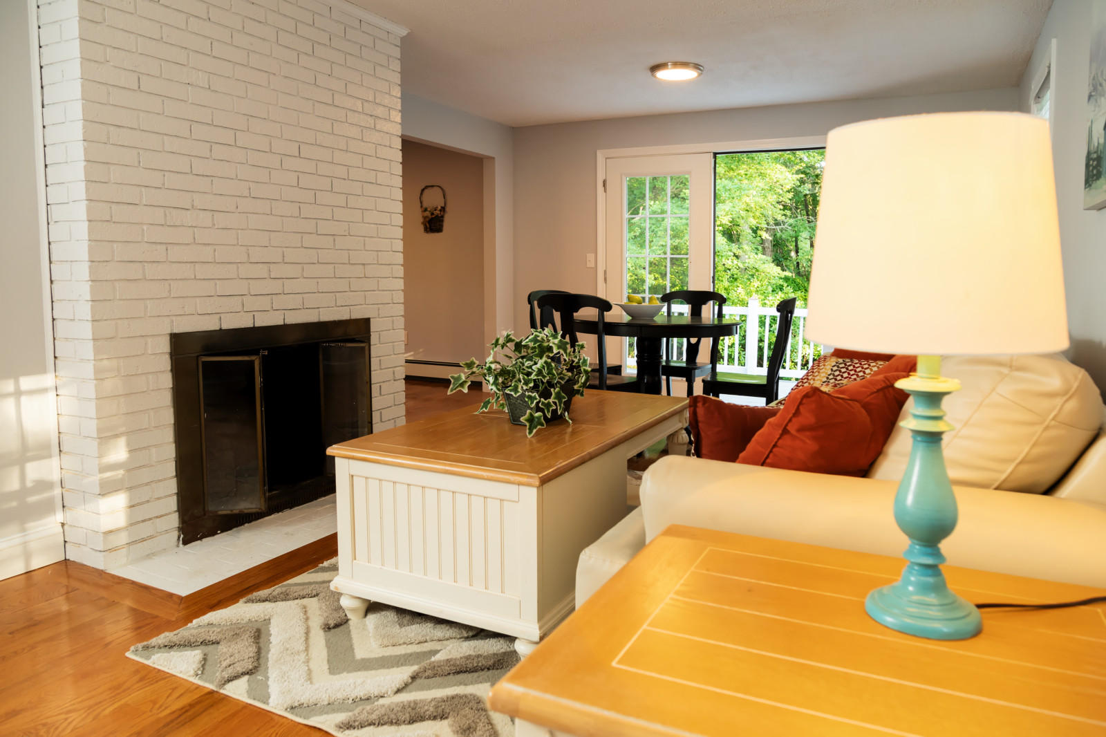 25 Fillmore Road West Yarmouth, MA 02673 - Photo 4 of 23 a living room with furniture and a fireplace