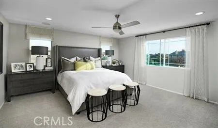 a bed room with a bed and a window